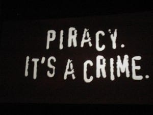 Screengrab from the short film "Piracy. It's a crime." From the campaign with the same name. The now iconic clip, featuring on millions of DVDs, tells the viewer that illegally downloading files is a crime, comparable to physical crimes like stealing a car. Photo: Elias Bizannes 